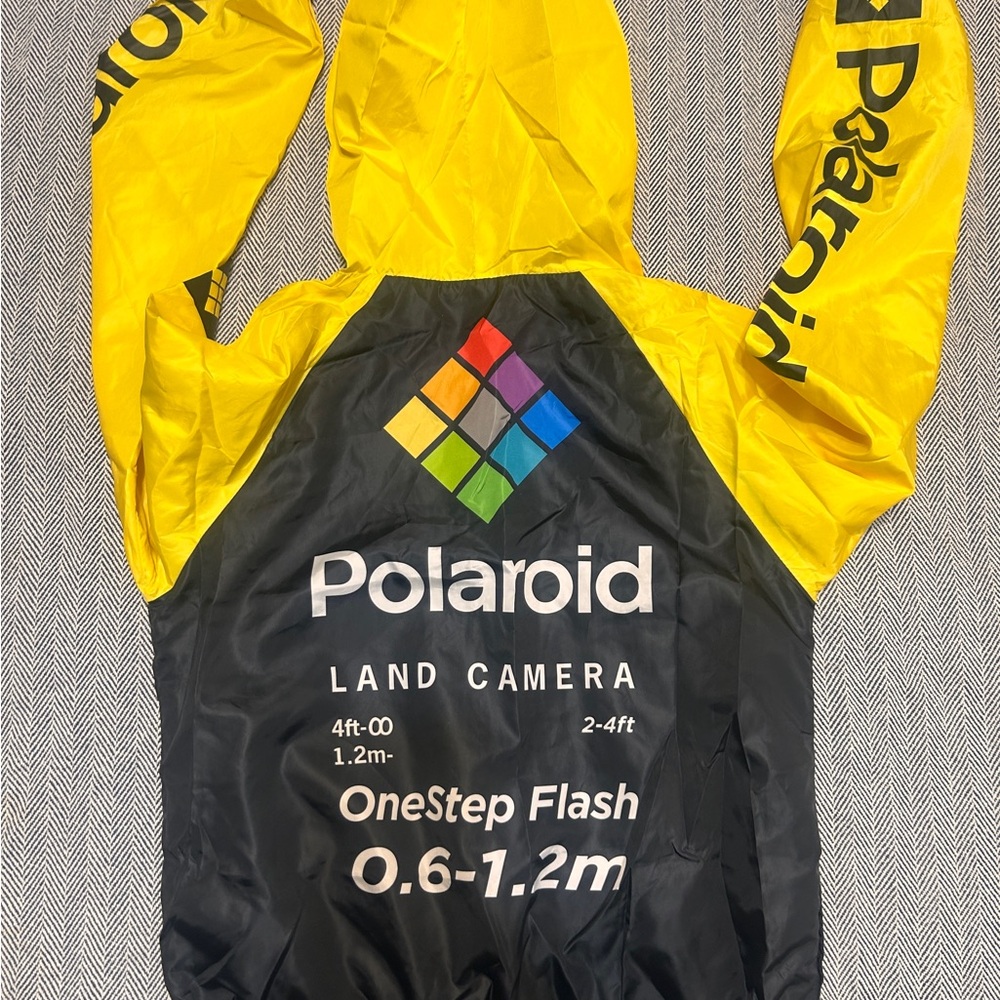 Polaroid Black and Yellow Jacket with Rainbow Stripes